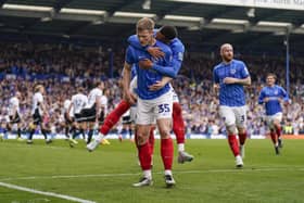 Pompey's Rob Atkinson celebrates his second goal against Derby County. Jason Brown/ProSportsImages