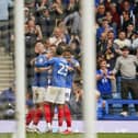 Pompey celebrate Rob Atkinson's last-gasp leveller against Derby. Picture: Jason Brown/ProSportsImages