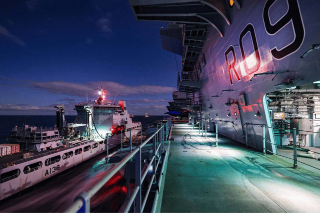 Pictured: RFA Tidespring carrying out a replenishment at sea drill with HMS Prince of Wales during Exercise Strike Warrior.