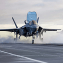 An F-35B fighter jet which has been stranded in India has been moved to a hangar to be fixed.
