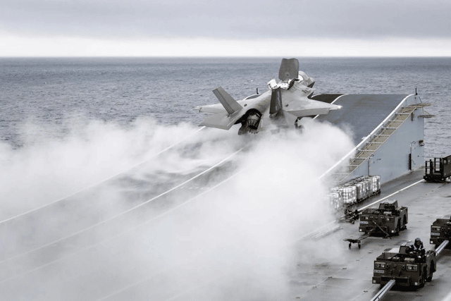 F-35B fighter jets will be pushed to their limits as they will be deployed alongside the Royal Navy aircraft carrier HMS Prince of Wales. Picture: A stealth fighter flying off of the flagship's flight deck.