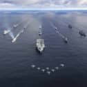 HMS Prince of Wales will be joined by a myriad of different aircraft when she deploys to the Indo-Pacific region. She will be joined by various Royal Navy ships and other capabilities.