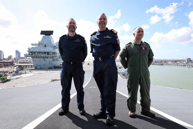 Royal Navy aircraft carrier HMS Prince of Wales will leave Portsmouth and take charge of the UK Carrier Strike Group in the Indo-Pacific region. From left, Captain Will Blackett RN, Commanding Officer of HMS Prince of Wales; Commodore James Blackmore RN, Commander Carrier Strike Group; and Captain Colin McGannity RN, Commander Air Group.