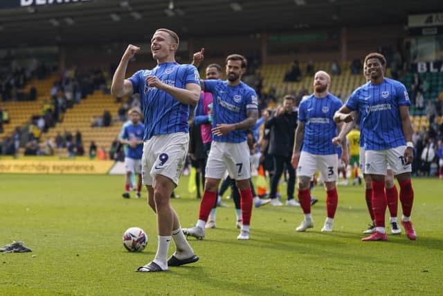 Colby Bishop leads the celebrations at the final whistle at Carrow Road