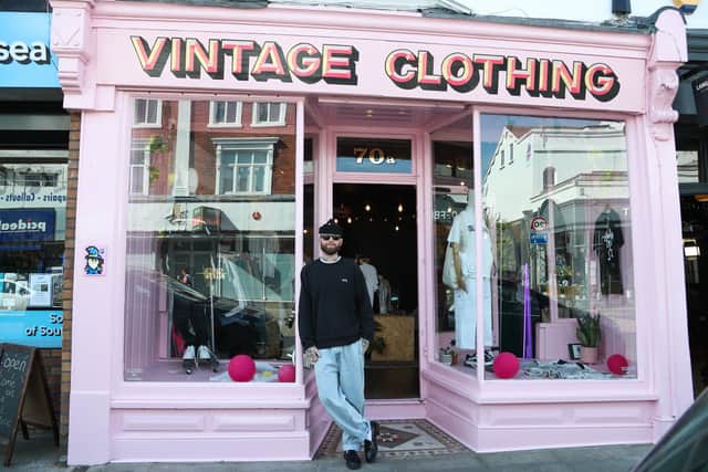 Merlin Pitt, owner of Actually Merlin Vintage, stands outide of his vintage clothing shop on Albert Rd, Southsea. 
