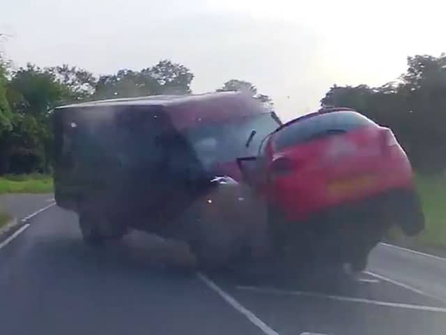 Minibus smashes head-on into car - seriously injuring three.