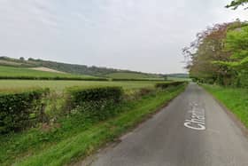 An "illegal rave" was shut down near Chichester with 15 people arrested.