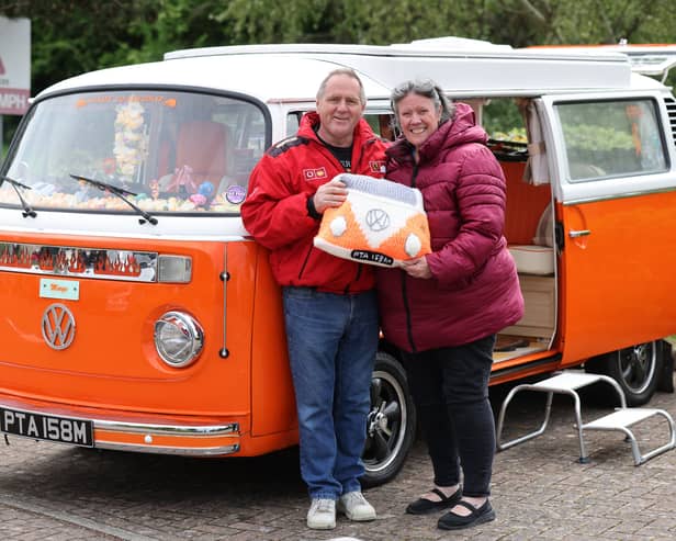 Car enthusiasts rushed to Port Solent to showcase their love for vintage camper vans. Pictured is Dave and Jill Britton with their van Marge