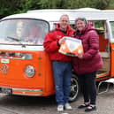 Car enthusiasts rushed to Port Solent to showcase their love for vintage camper vans. Pictured is Dave and Jill Britton with their van Marge