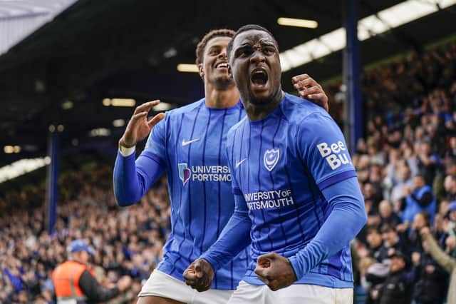 Christian Saydee and Kusini Yengi celebrate Pompey securing their Championship status following a 1-0 win over Watford. Picture: Jason Brown/ProSportsImages