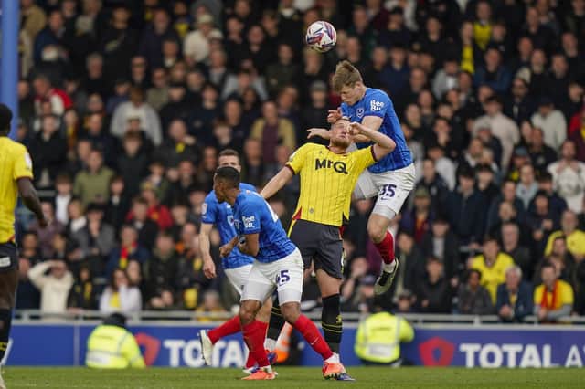 Rob Atkinson wins yet another aerial battle in the 1-0 win over Watford - and Pompey haven't ruled out keeping him. Picture: Jason Brown/ProSportsImages
