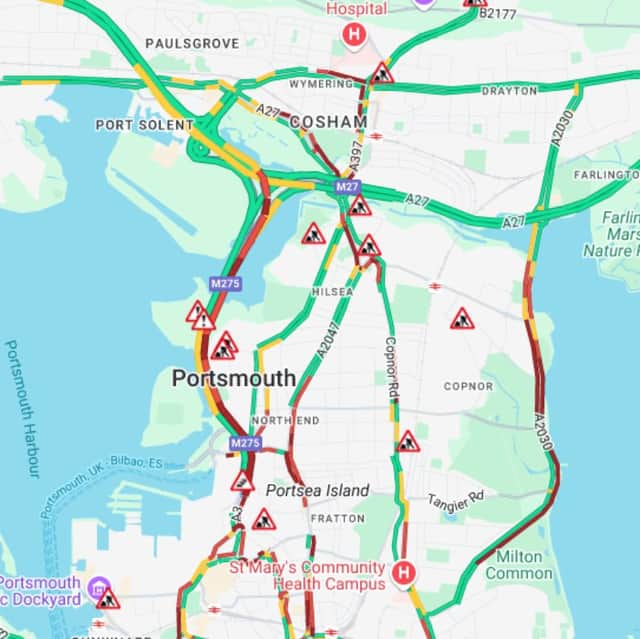 Traffic is "very slow" on the M275 as smoke from a nearby fire continues to bellow.