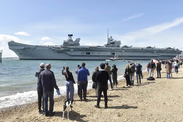Large crowds gathered along the Hot Walls in Old Portsmouth to watch HMS Prince of Wales leave the city for a major Royal Navy Carrier Strike Group deployment to the Indo-Pacific on Tuesday, April 22 2025.

Picture: Sarah Standing (220425-2040)
