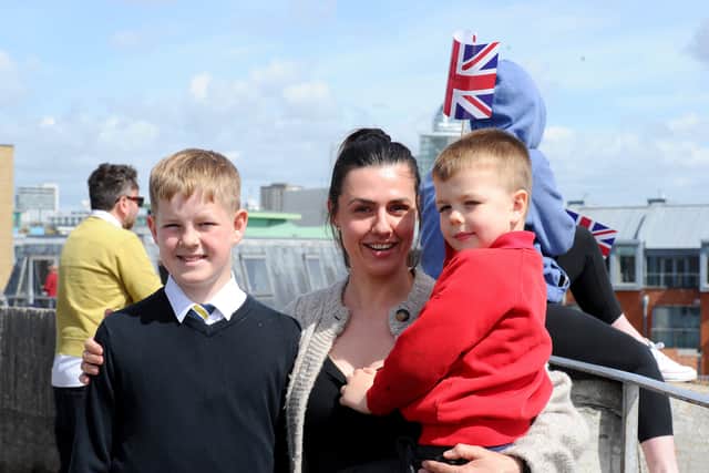 Pictured is: Kristie Barker with her sons Ethan (12) and Kit (5) from Gosport, waiting to wave off Adrian Barker.
Picture: Sarah Standing (220425-4864)