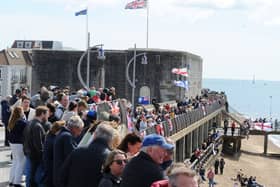 Large crowds gathered along the Hot Walls in Old Portsmouth to watch HMS Prince of Wales leave the city for a major Royal Navy Carrier Strike Group deployment to the Indo-Pacific on Tuesday, April 22 2025.

Picture: Sarah Standing (220425-4866)