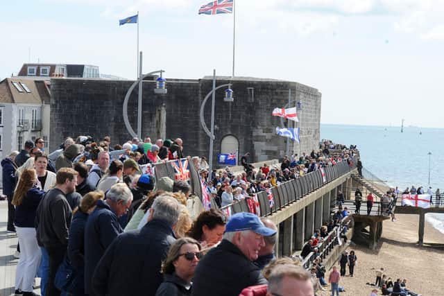Large crowds gathered along the Hot Walls in Old Portsmouth to watch HMS Prince of Wales leave the city for a major Royal Navy Carrier Strike Group deployment to the Indo-Pacific on Tuesday, April 22 2025.
Picture: Sarah Standing (220425-4866)