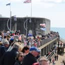 Large crowds gathered along the Hot Walls in Old Portsmouth to watch HMS Prince of Wales leave the city for a major Royal Navy Carrier Strike Group deployment to the Indo-Pacific on Tuesday, April 22 2025.

Picture: Sarah Standing (220425-4866)