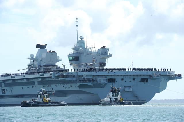Large crowds gathered along the Hot Walls in Old Portsmouth to watch HMS Prince of Wales leave the city for a major Royal Navy Carrier Strike Group deployment to the Indo-Pacific on Tuesday, April 22 2025.