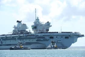 Large crowds gathered along the Hot Walls in Old Portsmouth to watch HMS Prince of Wales leave the city for a major Royal Navy Carrier Strike Group deployment to the Indo-Pacific on Tuesday, April 22 2025.