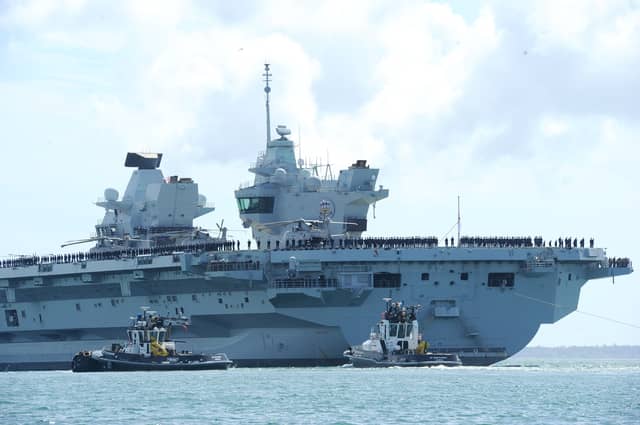 Large crowds gathered along the Hot Walls in Old Portsmouth to watch HMS Prince of Wales leave the city for a major Royal Navy Carrier Strike Group deployment to the Indo-Pacific on Tuesday, April 22 2025.