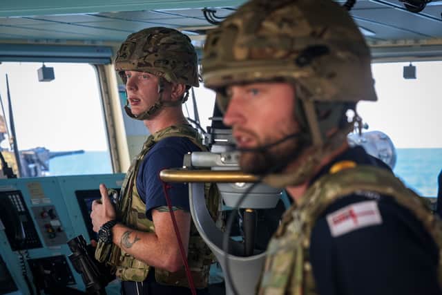 Pictured: HMS Spey's warfare and bridge teams conducting a Quickdraw Exercise. A small attack craft (provided by our FPDA partners) played the role of the enemy, closing in on the ship and prompting all upper deck gun crews to close up to defend the ship from attack. 