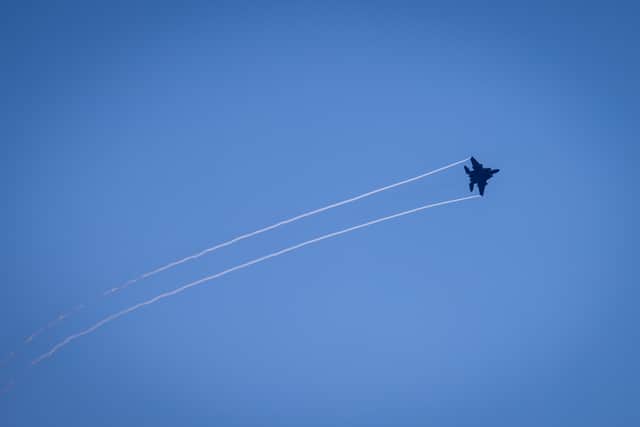 F-15 fighter jets from the Republic of Singapore Airforce played the role of the enemy,launching attacks on the task group