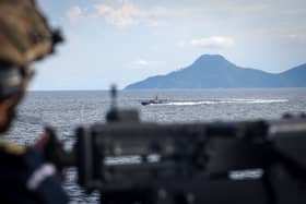Pictured: HMS Spey's warfare and bridge teams conducting a Quickdraw Exercise. A small attack craft (provided by our FPDA partners) played the role of the enemy, closing in on the ship and prompting all upper deck gun crews to close up to defend the ship from attack. 