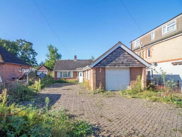The listing says: "No forward chain is offered with this greatly extended three bedroomed detached bungalow in Cowplain offering huge potential occupying a generous plot." 