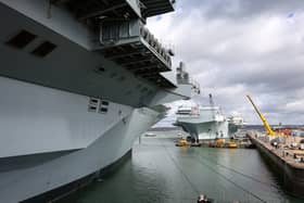 The government is pushing for drones to be integrated faster on the Royal Navy aircraft carriers, HMS Queen Elizabeth and HMS Prince of Wales.