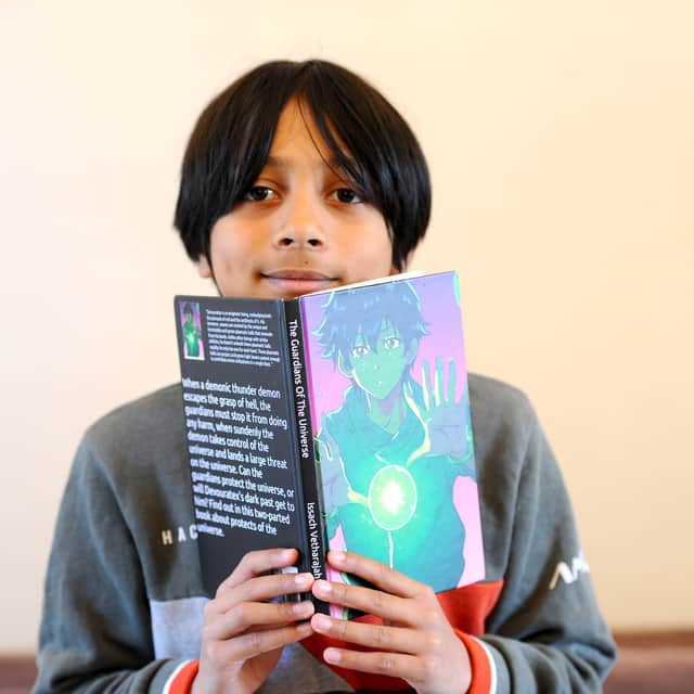 Issach Vetharajah with his Guardians of the Universe novel.
Picture: Sarah Standing (170425-4202)