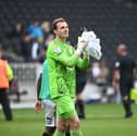Former Pompey keeper Craig MacGillivray has created a clean sheet record with MK Dons. Picture: Jane Russell