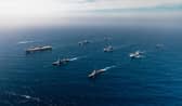 HMS Prince of Wales is continuing Operation Highmast, travelling to the Indo-Pacific on the Royal Navy’s biggest deployment this century. Viewed from the front - Row 1 (L-R) HMS Astute, HMS Prince of Wales, HMS Dauntless, Mendez Nunez;
Row 2 (L-R) RFA Tideforce, HNoMS Maud, RFA Tidespring; 
Row 3 (L-R) HNoMS Roald Amundsen, HMS Richmond.