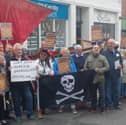 Protesters in Cowes High Street wearing pirate outfits and placards over unreliable and expensive ferry services to the Isle of Wight - including from Portsmouth