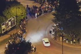 Toby Clarkson, 23, of London Road in Mickleham, Surrey, was caught on CCTV driving his white BMW dangerously at a car meet