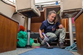 Gareth's wife Lizzy uses the Dyson Car+Boat to clean up the boat's cockpit