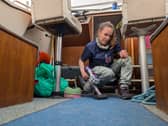 Gareth's wife Lizzy uses the Dyson Car+Boat to clean up the boat's cockpit