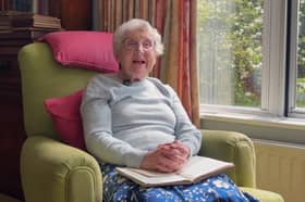Jane Richards, reading her father's sermon. 