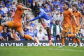 Pompey's Christian Saydee scores against Hull City today. Pic: Jason Brown/ProSportsImages