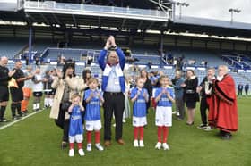 Alan Knight applauds the supporters at his Pompey charity football match. Picture; Sarah Standing