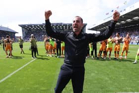 Ruben Selles led Hull the celebrations in front of a packed away end at Fratton Park on Saturday.