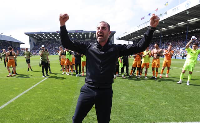 Ruben Selles led Hull the celebrations in front of a packed away end at Fratton Park on Saturday.