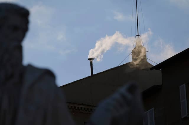 White smoke billows from the chimney of the Sistine Chapel where 133 cardinals are gathering on the second day of the conclave to elect a successor to late Pope Francis. Picture: AP Photo/Alessandra Tarantino