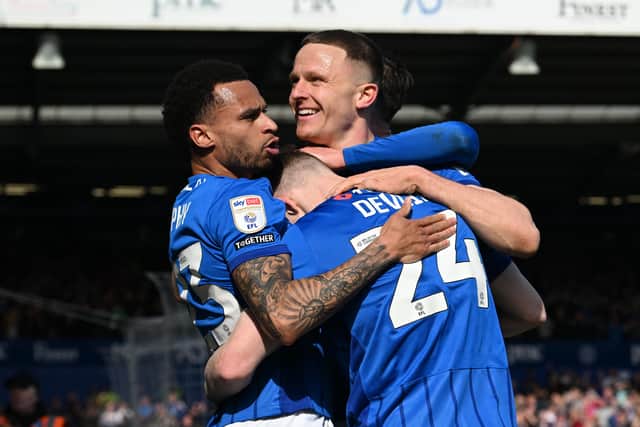 Pompey celebrate Colby Bishop's goal against Leeds in March.