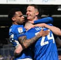 Pompey celebrate Colby Bishop's goal against Leeds in March.