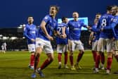 Ryley Towler celebrates his goal against Swansea on New Year's Day.