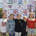 St John's C of E Primary School in Grove Road, Gosport, held a VE Day celebration for the 80th anniversary. 

Pictured is: (l-r) Bella (9), Noah (9), Laura (8), Jack (8) and Amelie (9)

Picture: Sarah Standing (090525-6610)