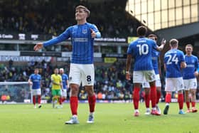 Freddie Potts celebrates in front of the Pompey fans at Carrow Road after the lues thumped the Canaries 5-3 on Good Friday