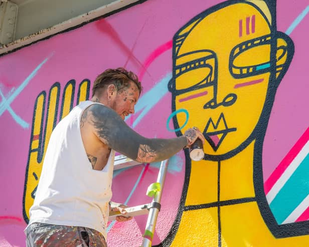 Artist Mister Samo has been working on a mural in the centre courtyard of Gunwharf Quays, tentatively titled 'Pride' in readiness for Portsmouth Pride 2025.