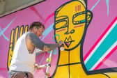 Artist Mister Samo has been working on a mural in the centre courtyard of Gunwharf Quays, tentatively titled 'Pride' in readiness for Portsmouth Pride 2025.
