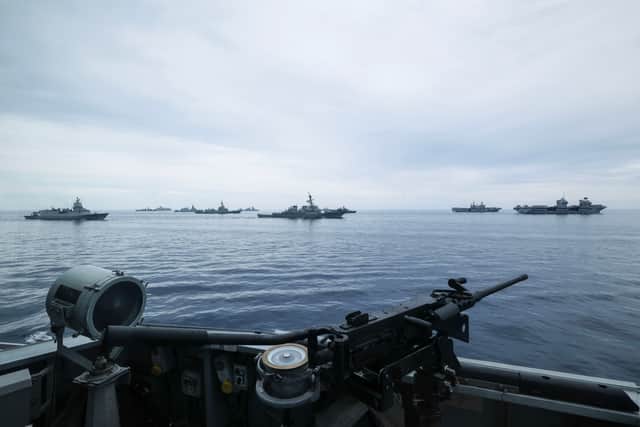Pictured: The task group getting into formation for the photographic exercise. View of the task group from the bridge wing of HMS Dauntless.